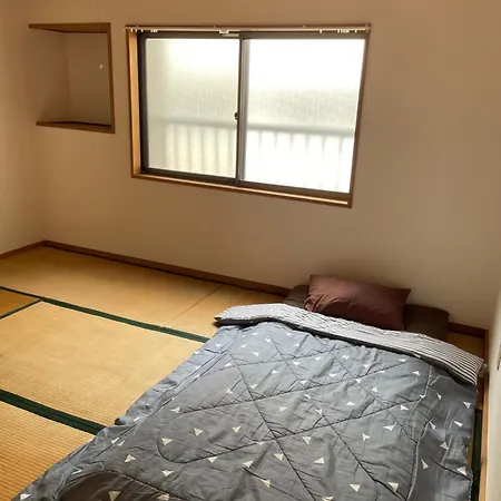 Villa 大阪魔力民泊-岸里 Osaka Esterno foto